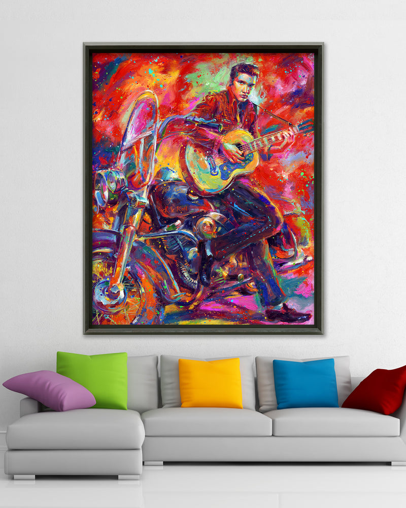 Oil on canvas original painting of the King of Rock 'n' Roll, Elvis, beside his Harley motorcycle in American nostalgic jeans and 1950s hair, playing his acoustic guitar in colorful brushstrokes, color expressionism style in a room setting.