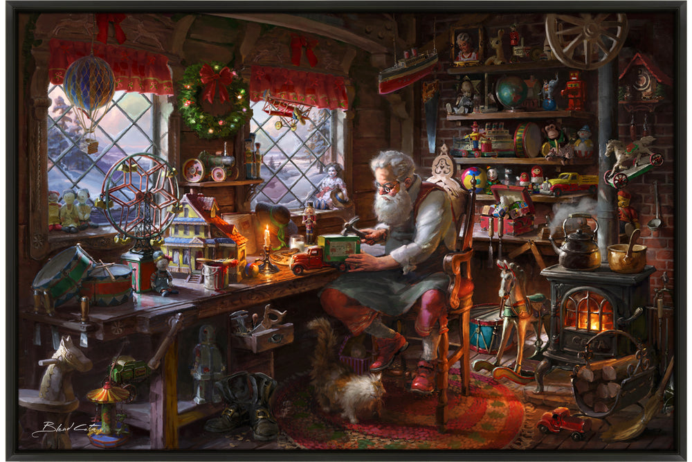 An original oil painting of Santa claus making toys in his workshop  during christmas with a cat by his boots and wood burning stove amongst the many children's toys.