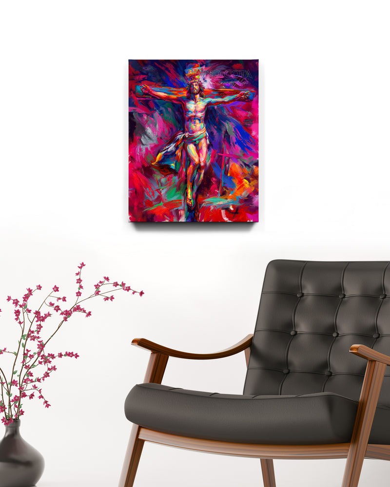 For The Love of God | Jesus Crucifixion - Blend Cota Art Print Framed on Canvas- Blend Cota Studios painting hanging on a white wall behind a black leather armchair