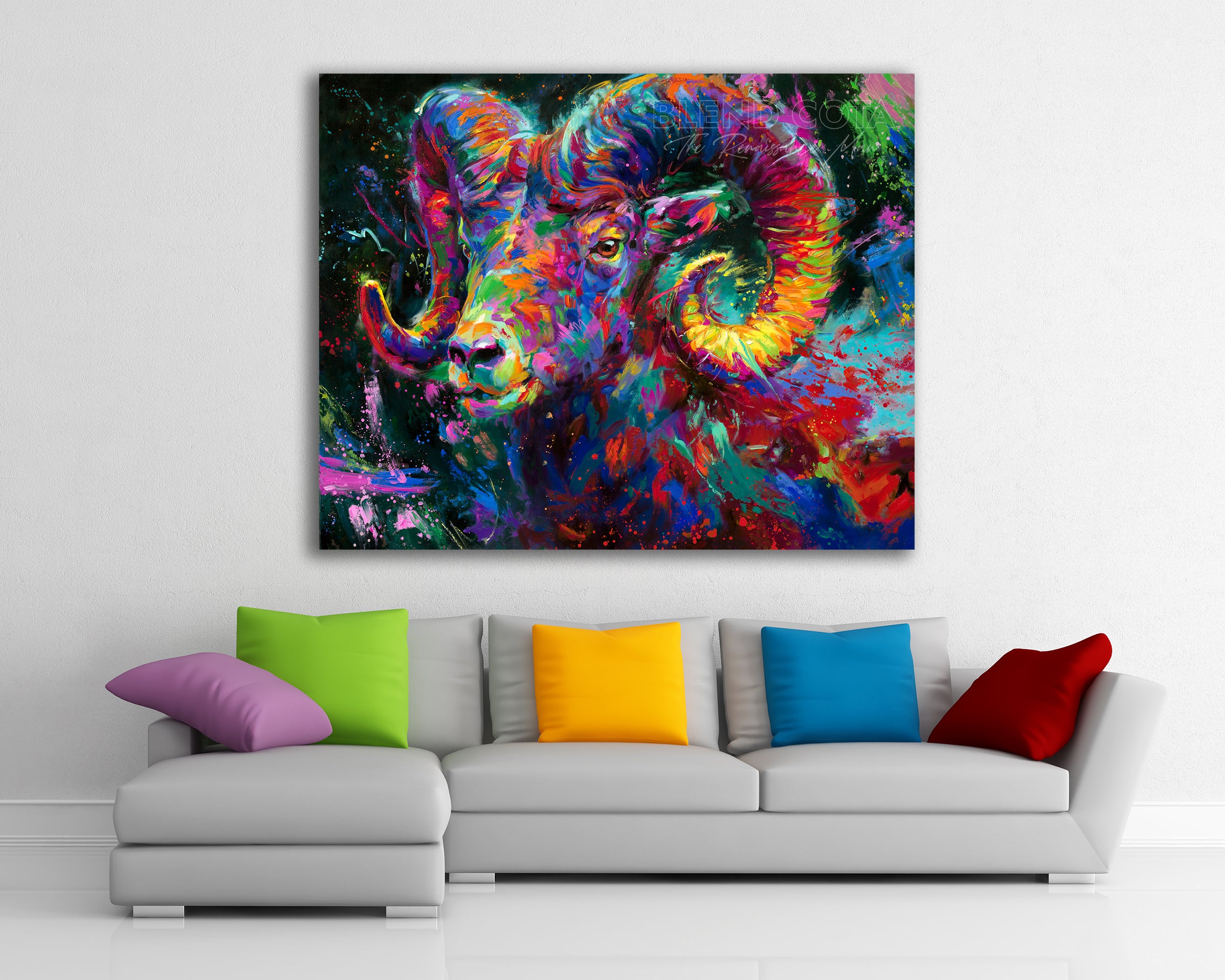 The Ram Spirit painted by Blend Cota Limited Edition Art Framed on Canvas from Blend Cota Studios with painting hanging on a white wall behind a colorful couch