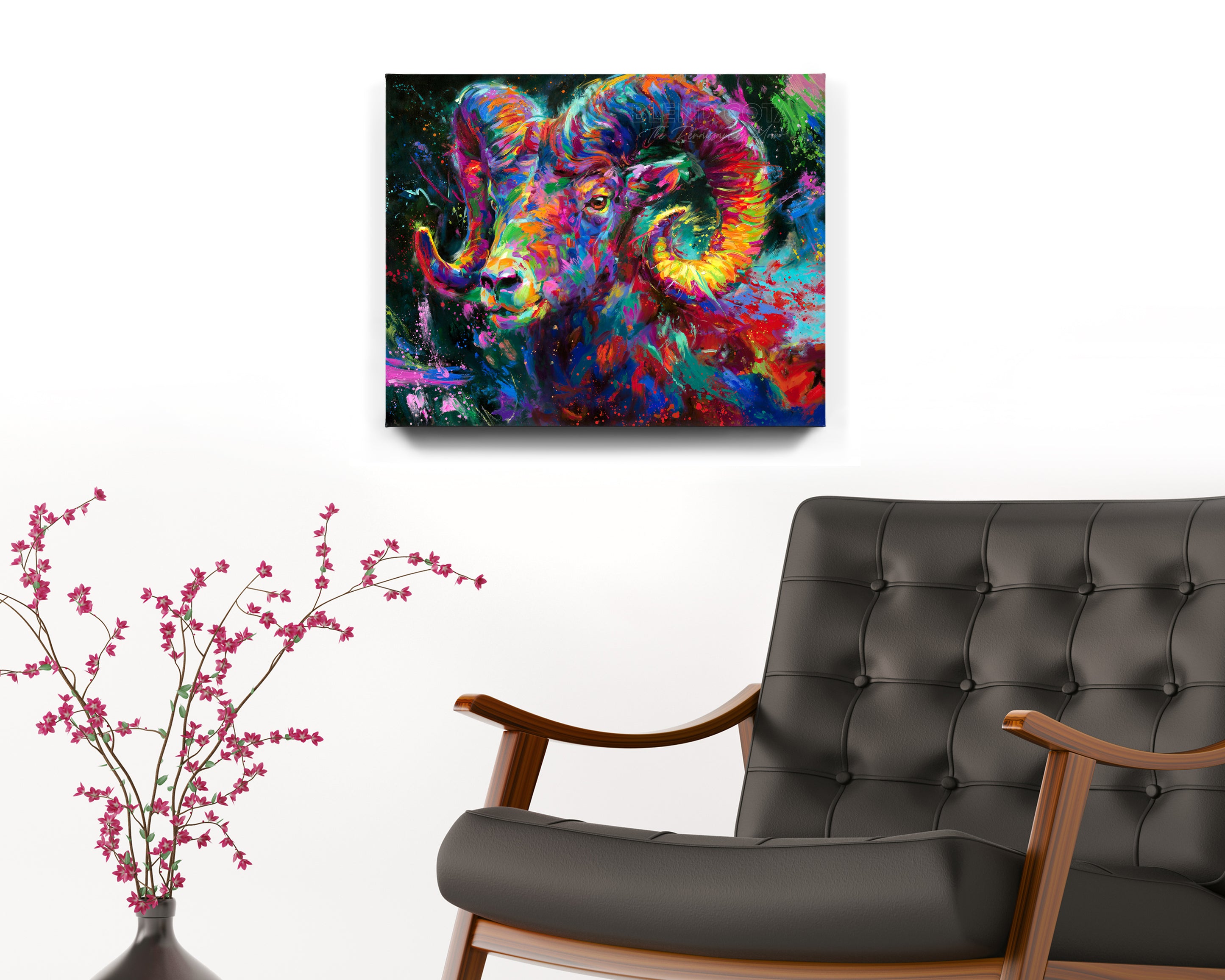 The Ram Spirit painted by Blend Cota Art Print on metal from Blend Cota Studios with painting hanging on a white wall behind a black leather armchair