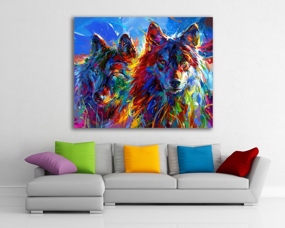 Wolves True Love painted by Blend Cota Limited Edition Art Framed on Canvas from Blend Cota Studios with a painting hanging on white wall behind a couch with colourful pillows