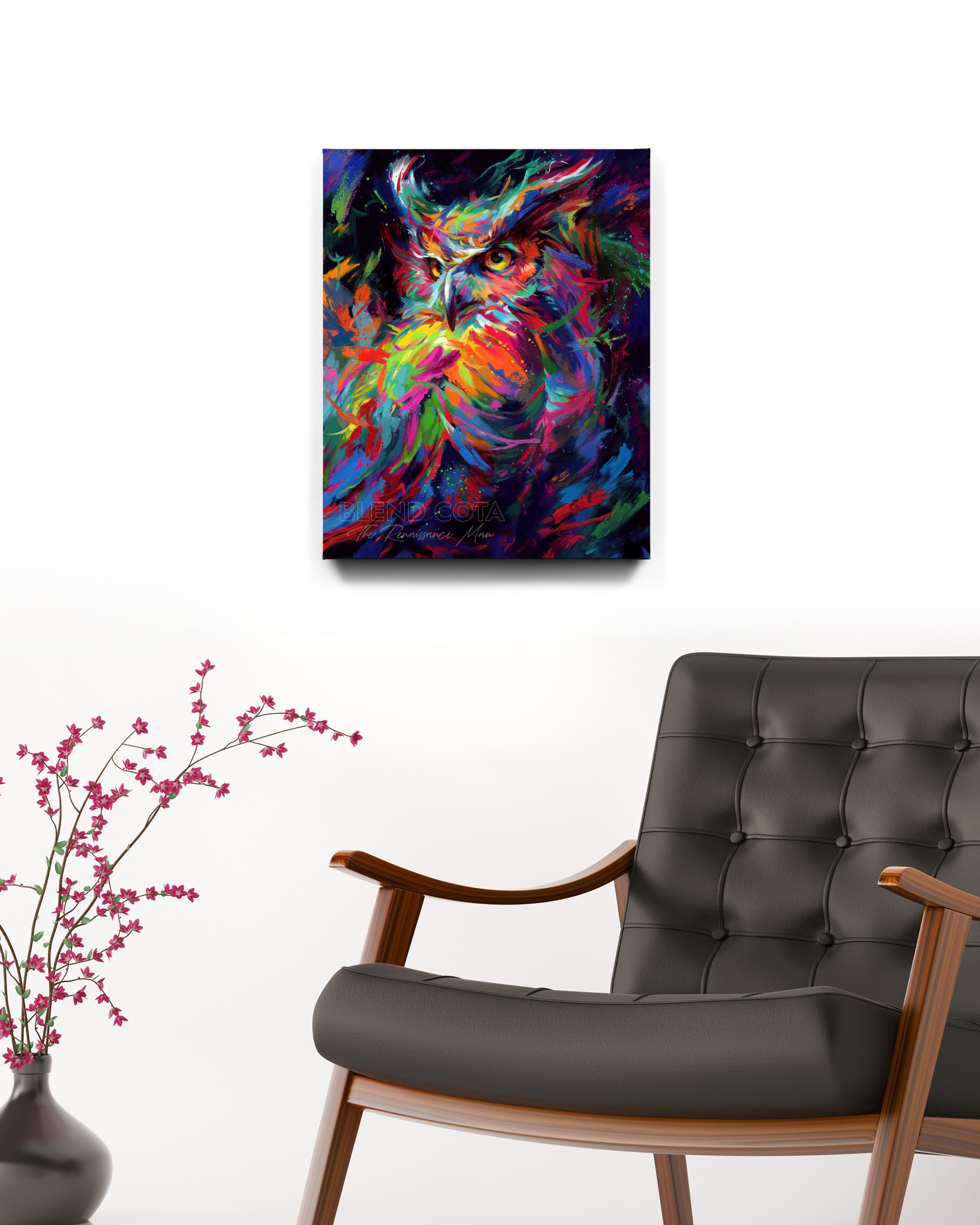 Art print of blue, green and orange owl in the night sky, symbol of wisdom and knowledge, and represented with Athena of Greece and Minerva of Rome, piercing gaze of great horned owl in colorful brushstrokes, color expressionism style in a room setting.