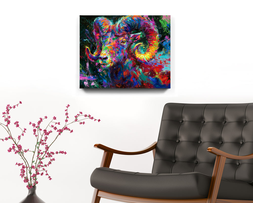 
                  
                    The Ram Spirit painted by Blend Cota Art Print on metal from Blend Cota Studios with painting hanging on a white wall behind a black leather armchair
                  
                